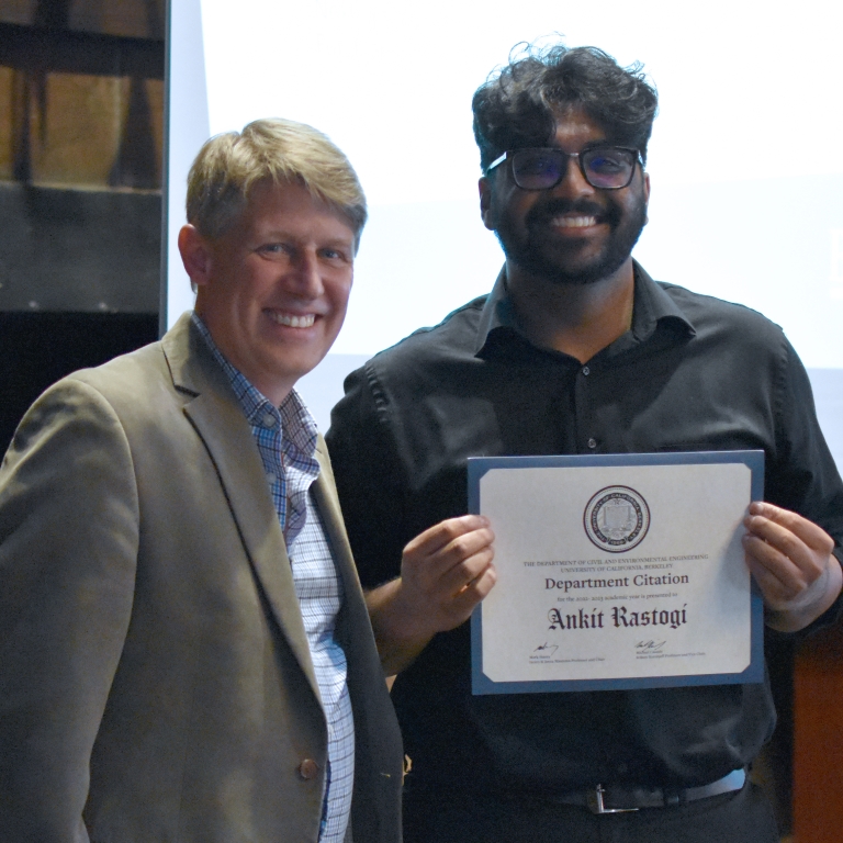 Chair Stacey presents the Departmental Citation to Ankit Rastogi (Photo Credit: Erin Leigh Inama).