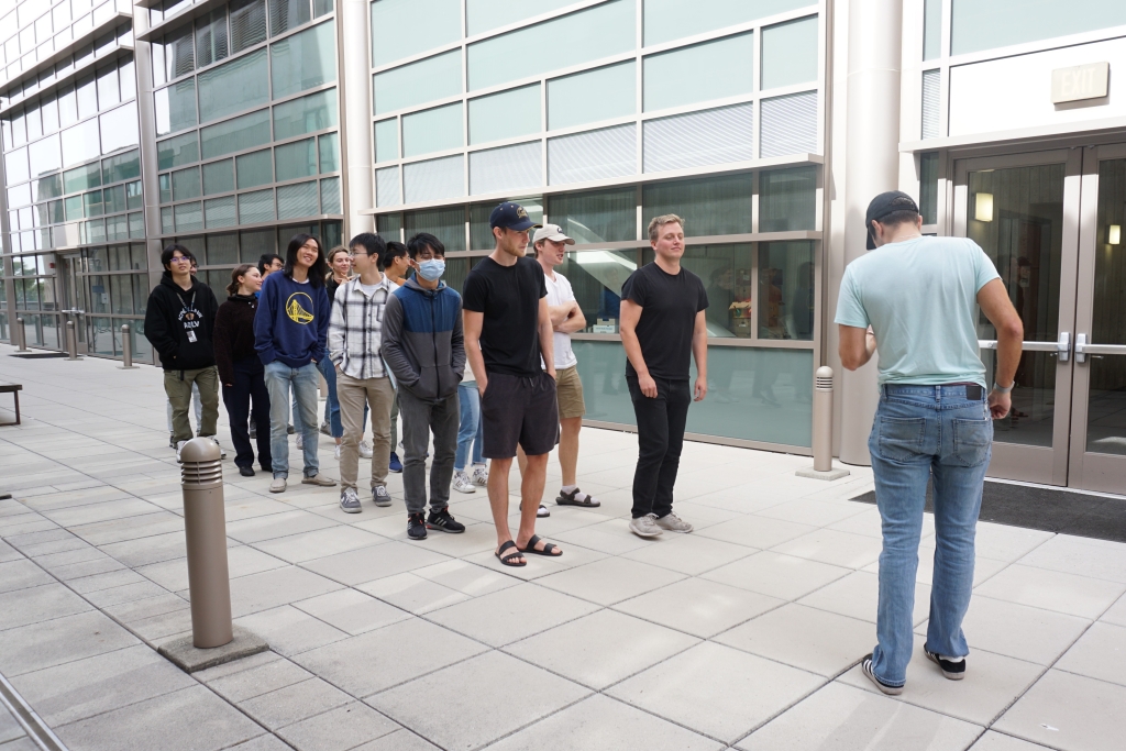 CE 249 students are practicing walking in sync together to collect frequency data points from the bridge.