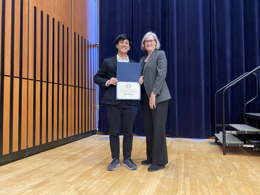 Chair Joan Walker presents Kyle Wong with the Tsuneo Sekine Fellowship. (Pictured left to right: Rune de Anda (left) and Chair Joan Walker (right). Photo Credit: Sarah Shaadi Sadeh)