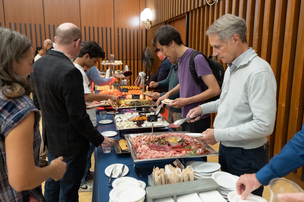 A collection of photos of guests from the CEE Community Highlights event during graduate student posters and research center highlights. 