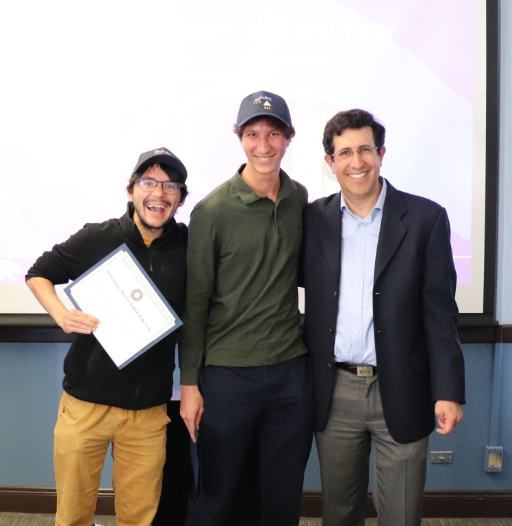 ITS Director Daniel A. Rodriguez presents MS/MCP students Jacob Champlin and Ameen DaCosta with ITS Masters Student of the Year Co-Award (Photo/Caption Credit: Amanda Cairo/ Berkeley ITS)