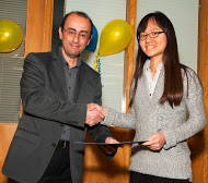 Kristin Kwok receiving the Tsuneo Sekine Fund