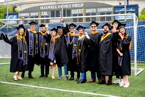 A group photo of graduating CEE M.S. students from a previous commencement ceremony at Maxwell Stadium. (Photo Credit: Adam Lau/Berkeley Engineering)