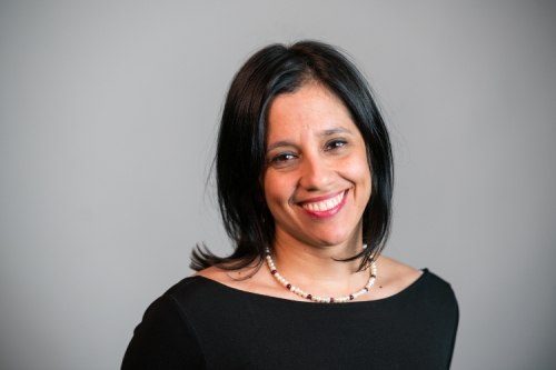 A headshot of CEE Professor Marta Gonzalez against a charcoal grey background. (Photo Credit: Adam Lau/Berkeley Engineering)