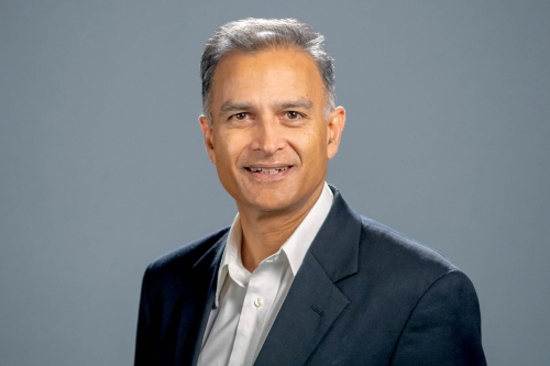 A headshot of CEE Professor Sanjay Govindjee against a charcoal grey background. (Photo Credit: Adam Lau/Berkeley Engineering)