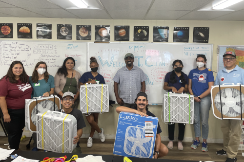 UC Berkeley students and faculty partnered with Little Manila Rising and Catholic Charities to build air purifiers at K-8 school, All Saints Academy, in Stockton. (Photo Credit: Nia Jones)