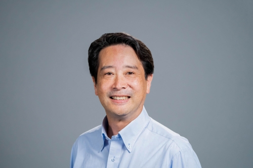 A headshot of CEE Professor Kenichi Soga against a charcoal grey background (Photo Credit: Adam Lau/Berkeley Engineering).
