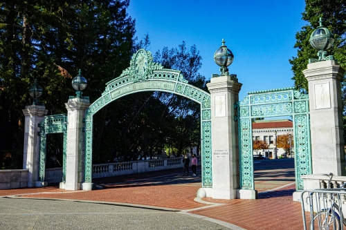 A picture of Sather Gate on the UC Berkeley campus (Photo Credit: Jeremy Huang/Unsplash)
