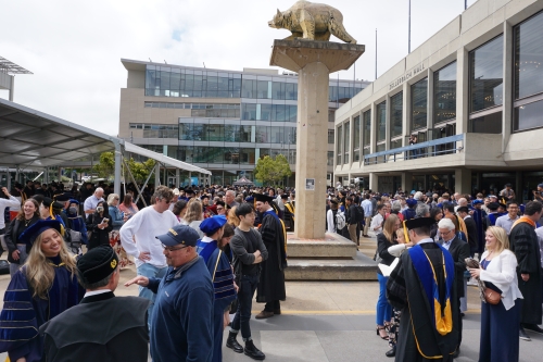 Berkeley CEE Engineering Ph.D. graduates celebrate with loved ones outside Zellerbach Hall after the Class of 2023 Doctoral Commencement. (Photo Credit: Pooja Nerkar/Berkeley CEE)