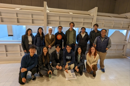 A group photo of the Transportation Graduate Students Organizing (TRANSOC) while visiting the California High-Speed Rail Authority's showroom in Sacramento (Photo Credit: Melody Tsao).