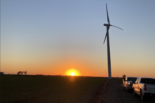 Research scientist Linqing Luo and Ph.D. student James Xu helped install fiber optic cables for structural health monitoring of wind turbines in Oklahoma through their work at the Center for Smart Infrastructure (Photo Credit: James Xu).