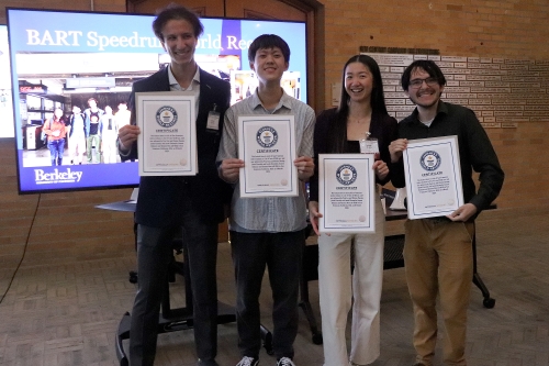 Members of the Guinness World Record–setting team for the fastest speed run across BART stations—Ameen DaCosta, Jacob Champlain, Winnie Zhuang, and Paul Liu—receive their official certificates (Photo/Caption Credit: Amanda Cairo/Berkeley ITS).